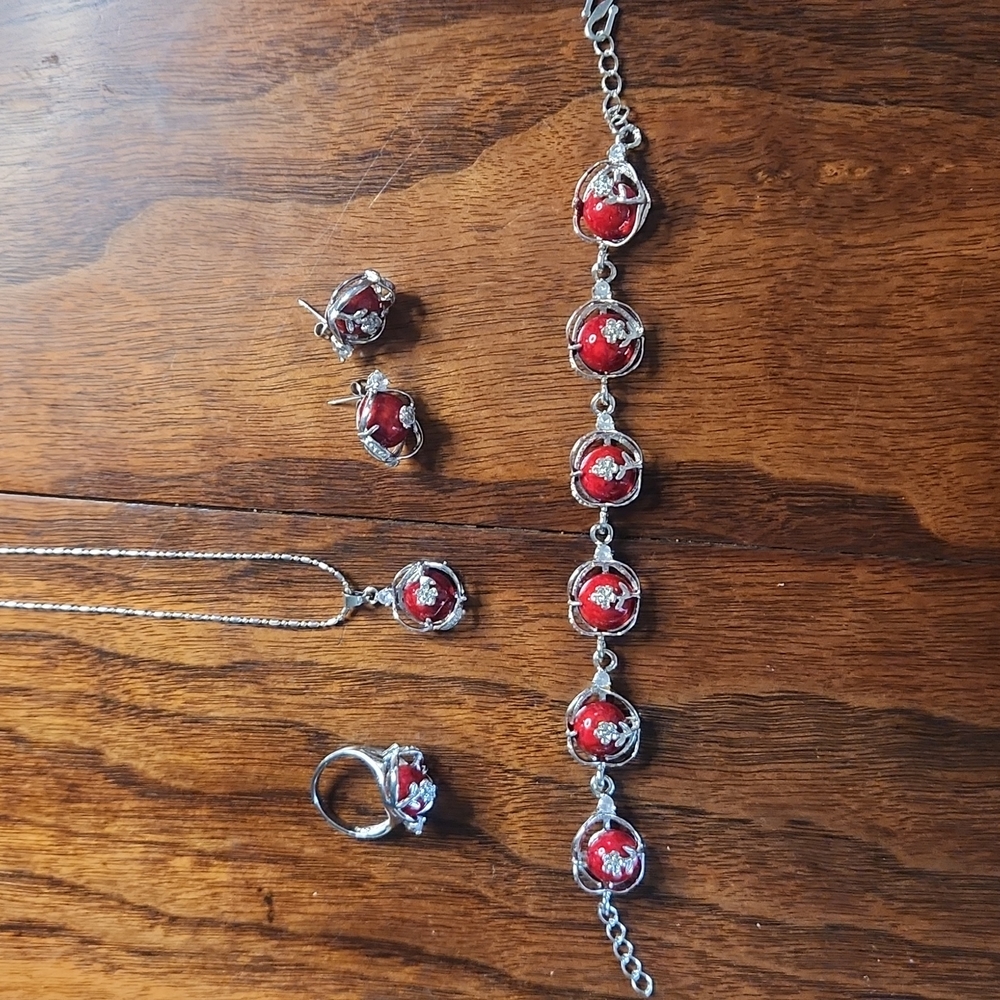 Red and silver flower bracelet, necklace, earrings, and ring
